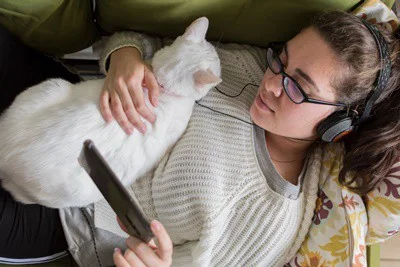 what does it mean when cats sleep on your chest?
